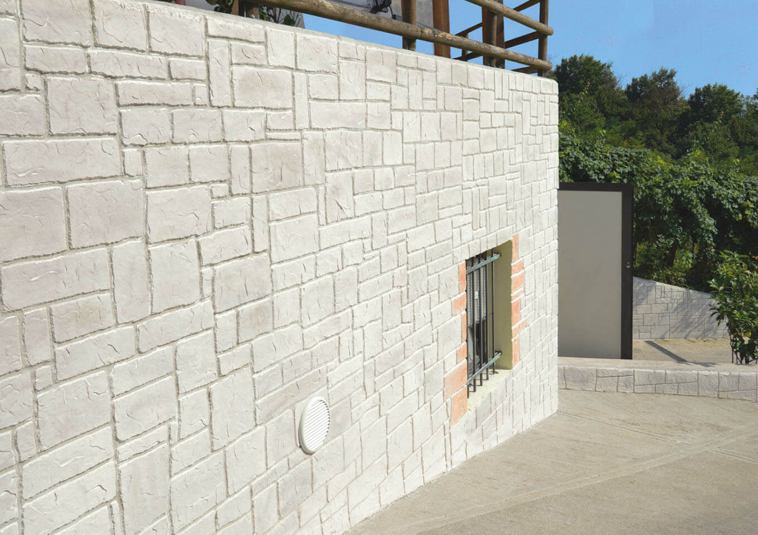 Muro esterno in cemento stampato effetto pietra